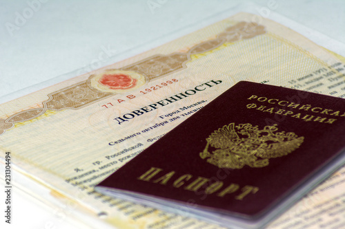 Russian documents. Notarial form of power of attorney to another person. Russian passport lies on top