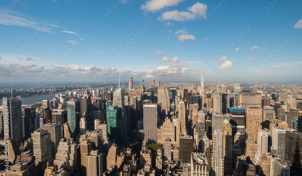 Aerial View of Upper Manhattan on a clear sunny day, Central Park visible in the distance