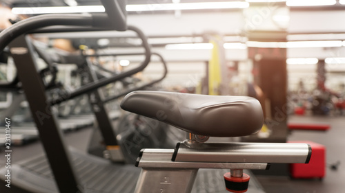 Close-up of a black saddle of an exercise bike