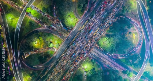Aerial hyperlapse of traffic jam at night on the Semanggi road junction in Jakarta city, Indonesia. Shot in 4k resolution photo