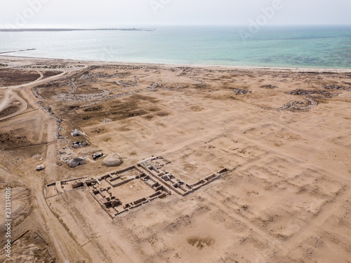 Al Zubarah (Az Zubara), ruined ancient Arabian town, north-western coast of the Qatar peninsula, Al Shamal. UNESCO World Heritage Site. Historical port for trade, pearl and fishing in the Persian Gulf photo