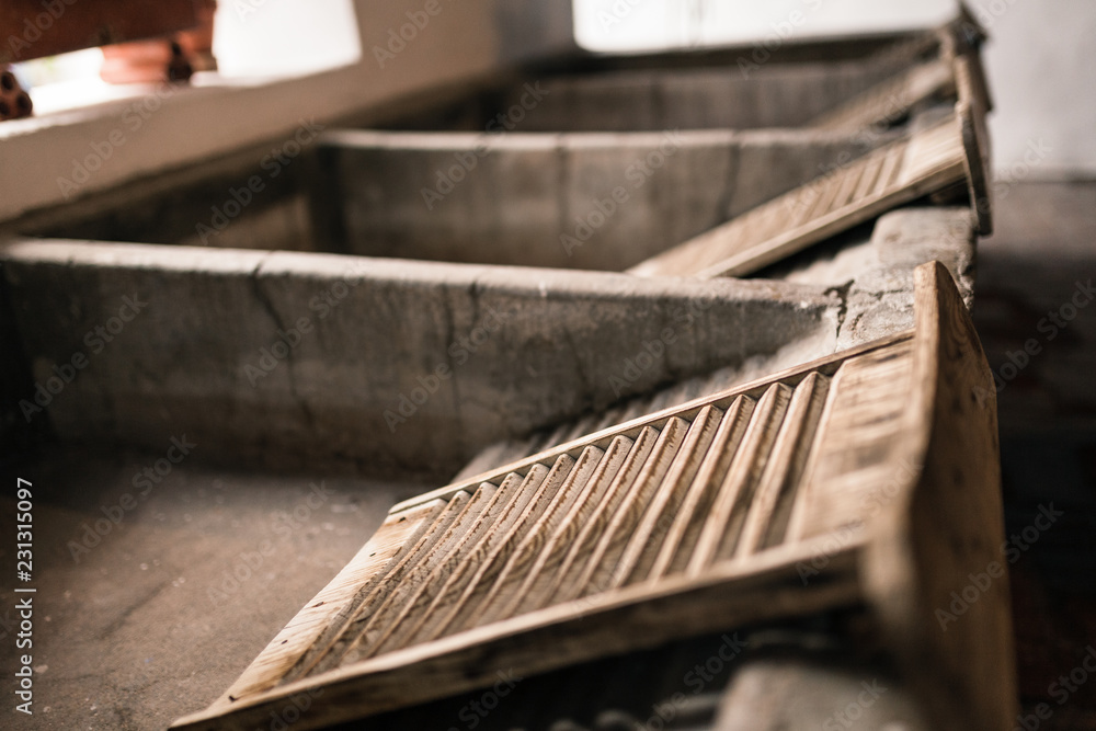 Samolepka Ancient laundry room in cordoba, spain with wooden washboards