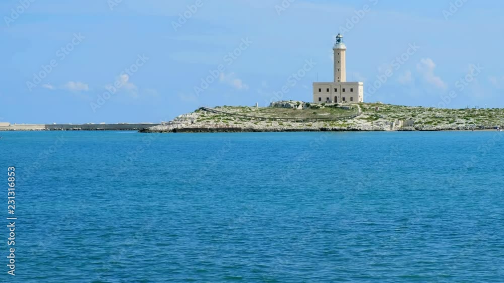 Faro di Vieste - Vieste Lighthouse sea background - in Gargano area , Apulia region, Italy Faro di Vieste - Vieste Lighthouse sea background - in Gargano area , Apulia region, Italy