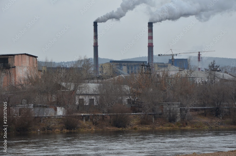 Two smoking funnels with river foreground Two smoking funnels with river foreground