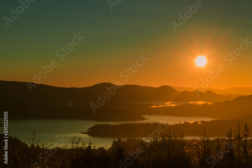 Fototapeta Naklejka Na Ścianę i Meble -  Landscape with sunrise over the mountain