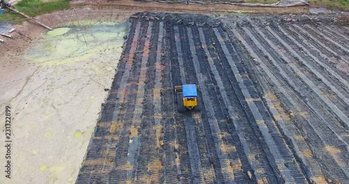 Aerial view of bulldozer on muddy 5