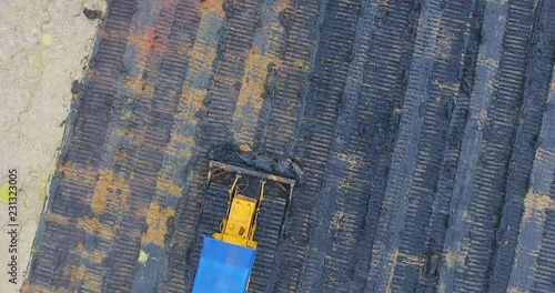 Aerial view of bulldozer on muddy 1