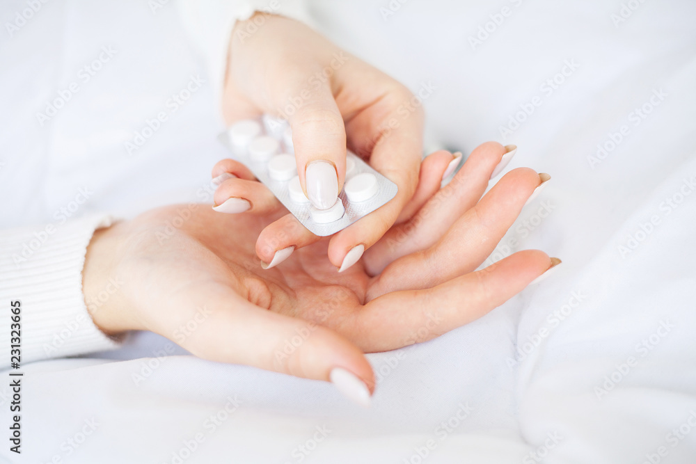 Medicine herb. Herbal pills in hand, palm, fingers with healthy medical plant. Vitamin supplement for care, medication Medicine herb. Herbal pills in hand, palm, fingers with healthy medical plant. Vitamin supplement for care, medication