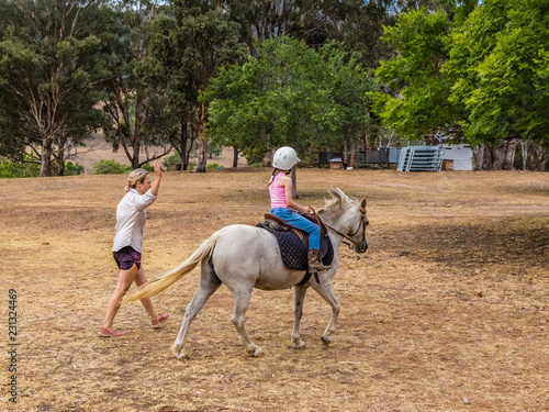 Young child learning to ride in the upper Hunter Valley, NSW, Australia.