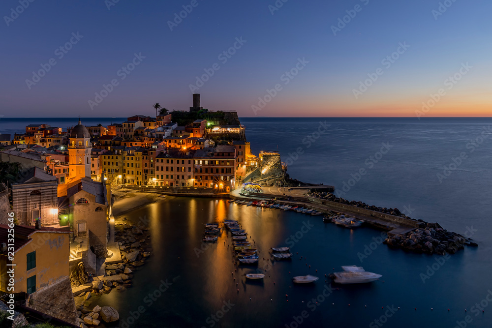 Aerial view of the historic center of Vernazza at blue hour, Cinque Terre, Liguria, Italy