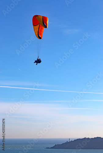 Tandem paraglider above Start Point