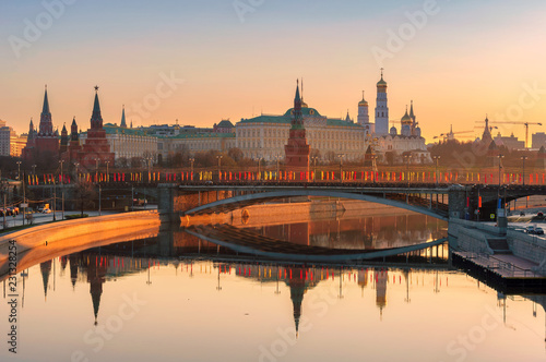 Moscow skyline at sunrise with Kremlin reflection on Moscow river. Kremlin with Kremlin Wall and towers. Moscow Russia.