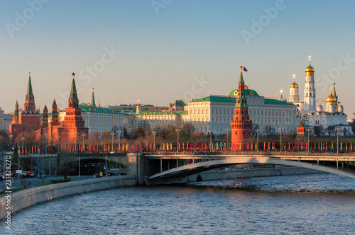 Moscow Kremlin at sunset with Moscow river, Kremlin Wall, towers and Grand Kremlin Palace. Moscow Russia.