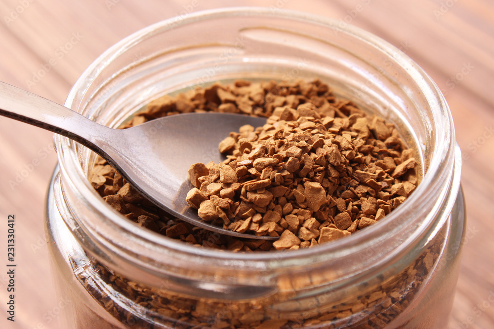 Put instant coffee in a cup. Flavored coffee Stock Photo Adobe Stock