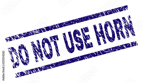 DO NOT USE HORN seal watermark with distress style. Blue vector rubber print of DO NOT USE HORN text with grunge texture. Text label is placed between parallel lines.