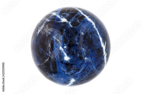 Macro mineral stone Sodalite ball on white background photo