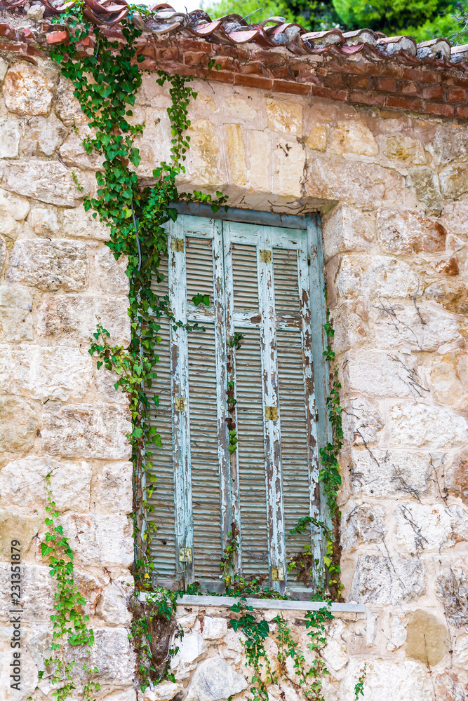 Old window details of Tatoi Palace which is a former Greek Royal Family summer residence and birthplace of King George II of Greece