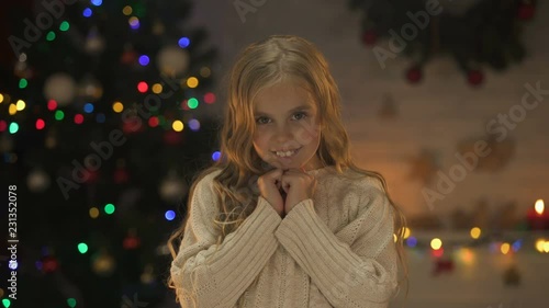 Wallpaper Mural Adorable little girl smiling to camera X-mas decorations sparkling behind, dream Torontodigital.ca