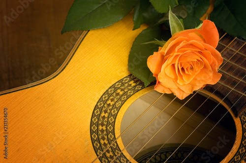 guitar with rose like romantic music concept  photo