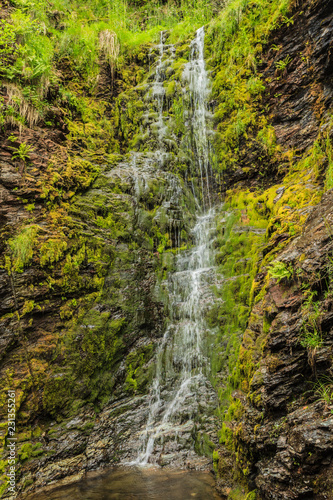 Little waterfall in mountains  Norway.