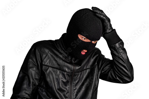 Thief in a mask grabbed his head, isolated on a white background