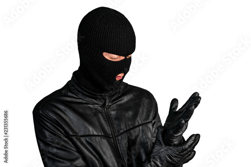 Thief in a mask wearing a glove, isolated on a white background