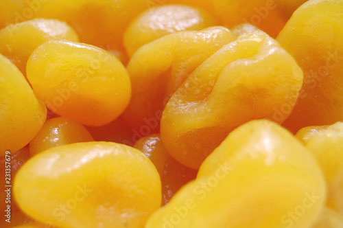 Bright and juicy pile of yellow sweet candied dried lemons.