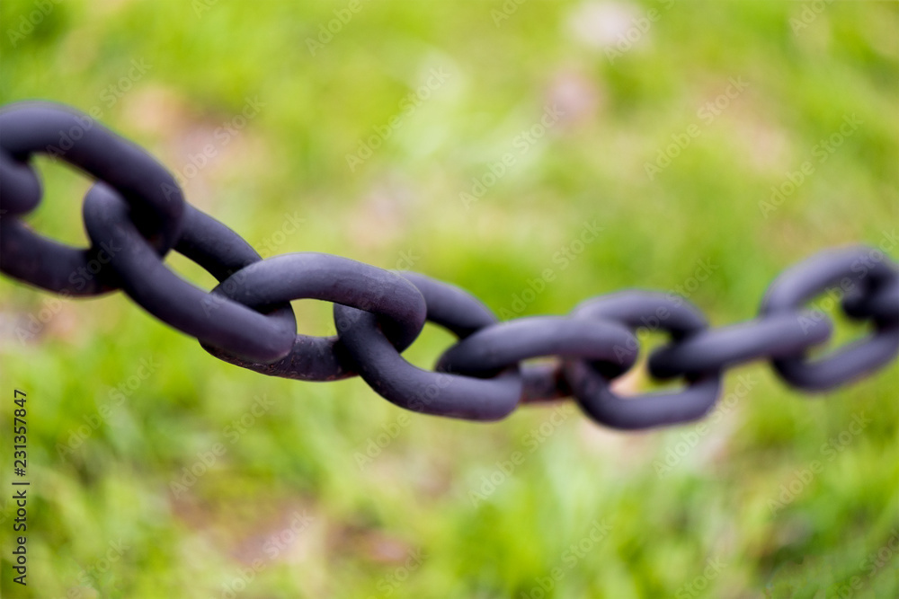 Abstract selective-focus shot of a chain with a very thin layer of sharpness. Macro shot. Abstract selective-focus shot of a chain with a very thin layer of sharpness. Macro shot.
