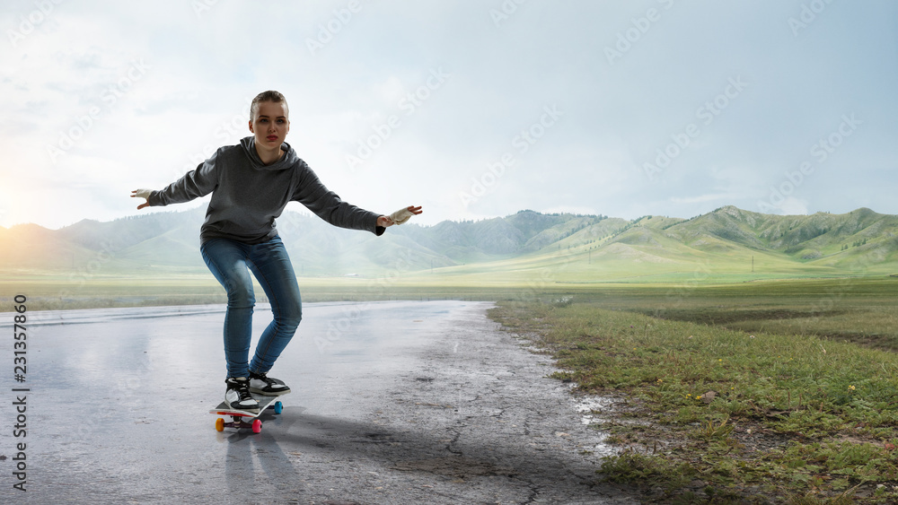 Teenager girl ride her skateboard. Mixed media Teenager girl ride her skateboard. Mixed media
