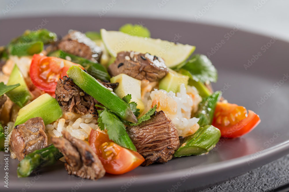 Closeup poke with beef and rice and vegetables. Hawaiian cuisine. Closeup poke with beef and rice and vegetables. Hawaiian cuisine.