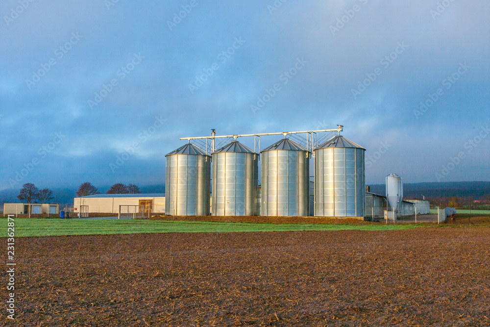 Silo in beautiful landscape with dramatical light Silo in beautiful landscape with dramatical light