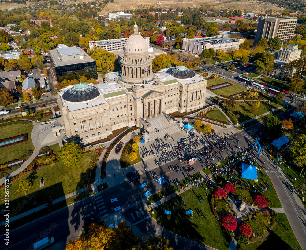 Gathering of people at the Idaho State Capital building in the fall time of the year