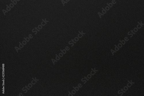 Black texture of  bumpy, rugged aluminium. Metal background. photo