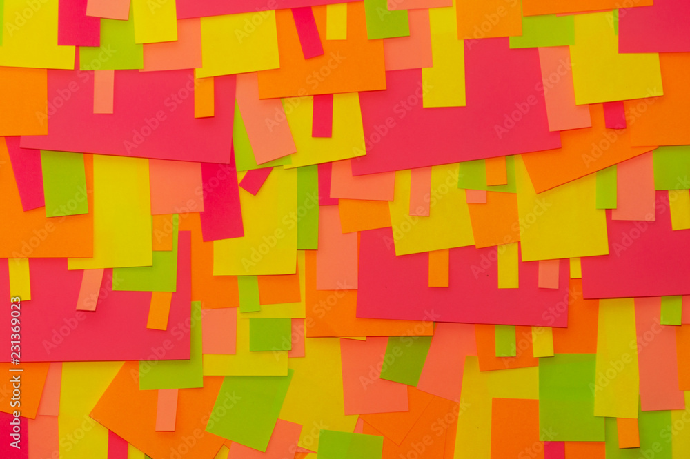 Bright multi-colored stickers on the office white board. Bright multi-colored stickers on the office white board.