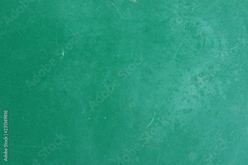Green painted aged metal table top surface detail