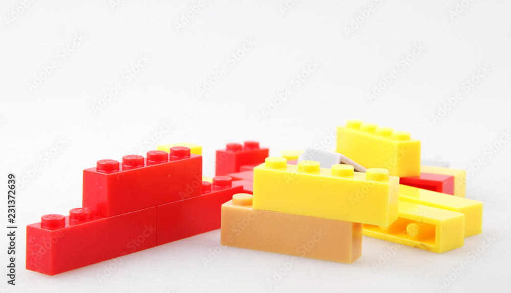 Obraz premium Plastic Toy Blocks Isolated On White Background