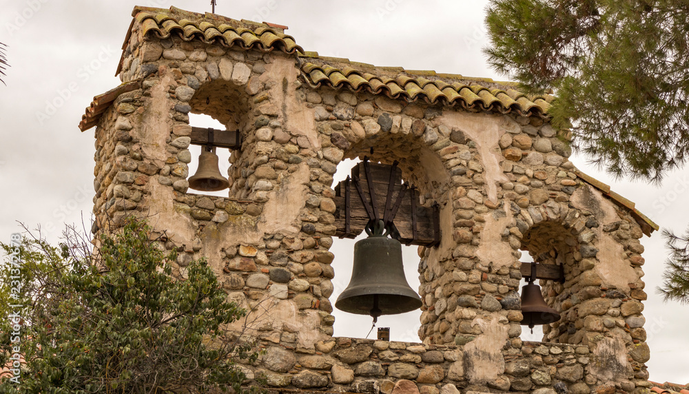 Obraz premium Mission San Miguel Arcángel bell tower, San Miguel, California, USA. One of the series of 21 Spanish religious outposts in Alta California founded by Father Junípero Serra.