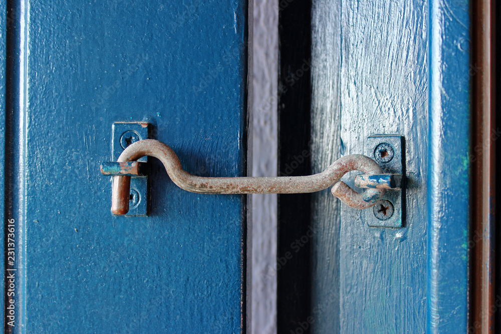 Blue window metal latch detail Blue window metal latch detail