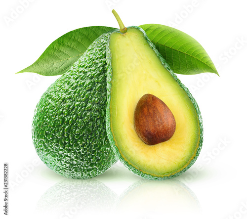 Isolated avocados. Two avocado fruits, one cut in half, on a branch with leaves isolated on white background with clipping path