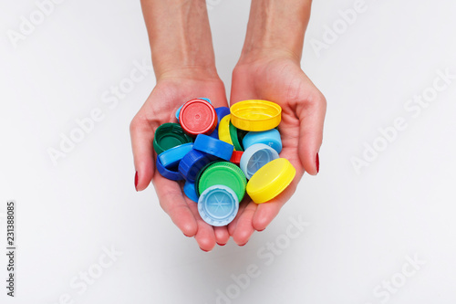 Foto save the world. Collect the bottle caps to support recykling.