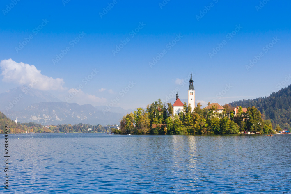 Autumn view on Bled Lake with Pilgrimage Church of the Assumption of Maria