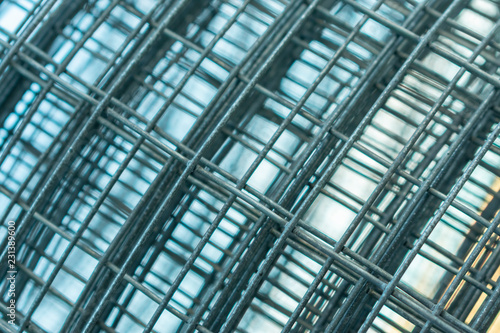 metal mesh twisted into a roll  close-up  as a background and abstraction