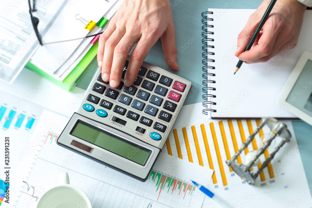 Calculator, chart, glasses, business financial report. Workplace accountant, analyst. Calculator, chart, glasses, business financial report. Workplace accountant, analyst.