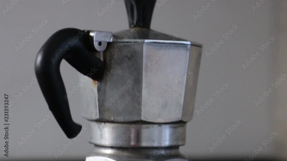 Coffee maker on the cooker preparing coffee Coffee maker on the cooker preparing coffee