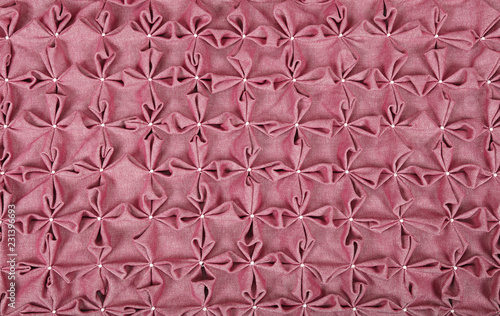 Close up background of pink textile puffs