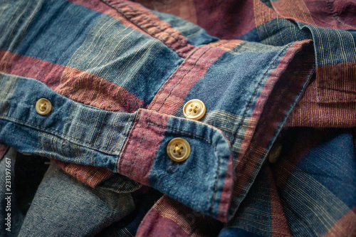 details of red and blue checkered shirt