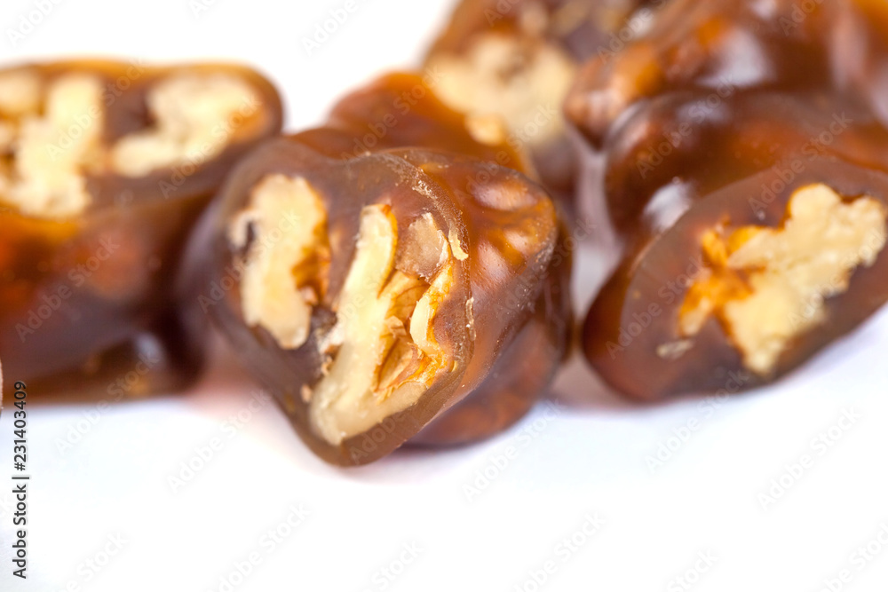 Tasty oriental sweets, churchkhela on white background. Georgian national dessert Tasty oriental sweets, churchkhela on white background. Georgian national dessert