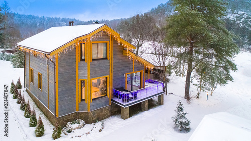 House in the winter. Cottag...