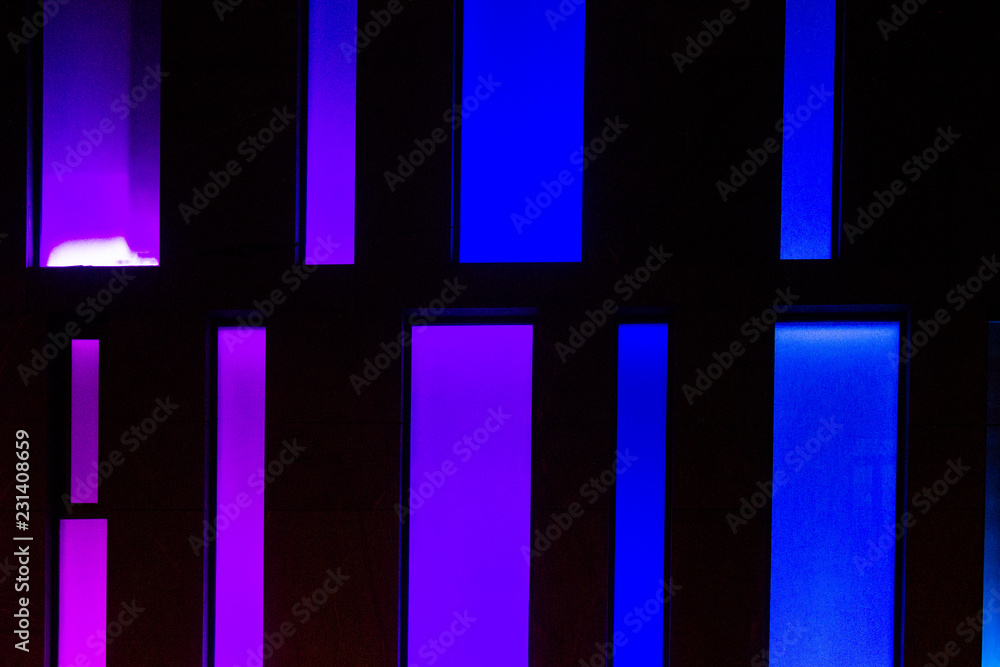 Coloured windows of shopping center at night.. Coloured windows of shopping center at night..