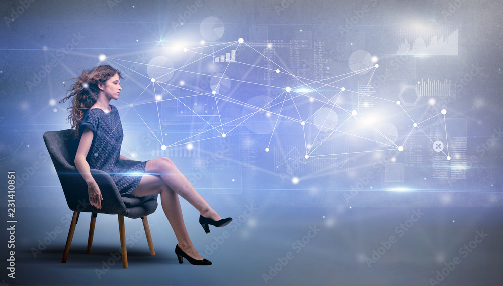 Elegant woman sitting in a sofa with network and connection concept
Elegant woman sitting in a sofa with network and connection concept